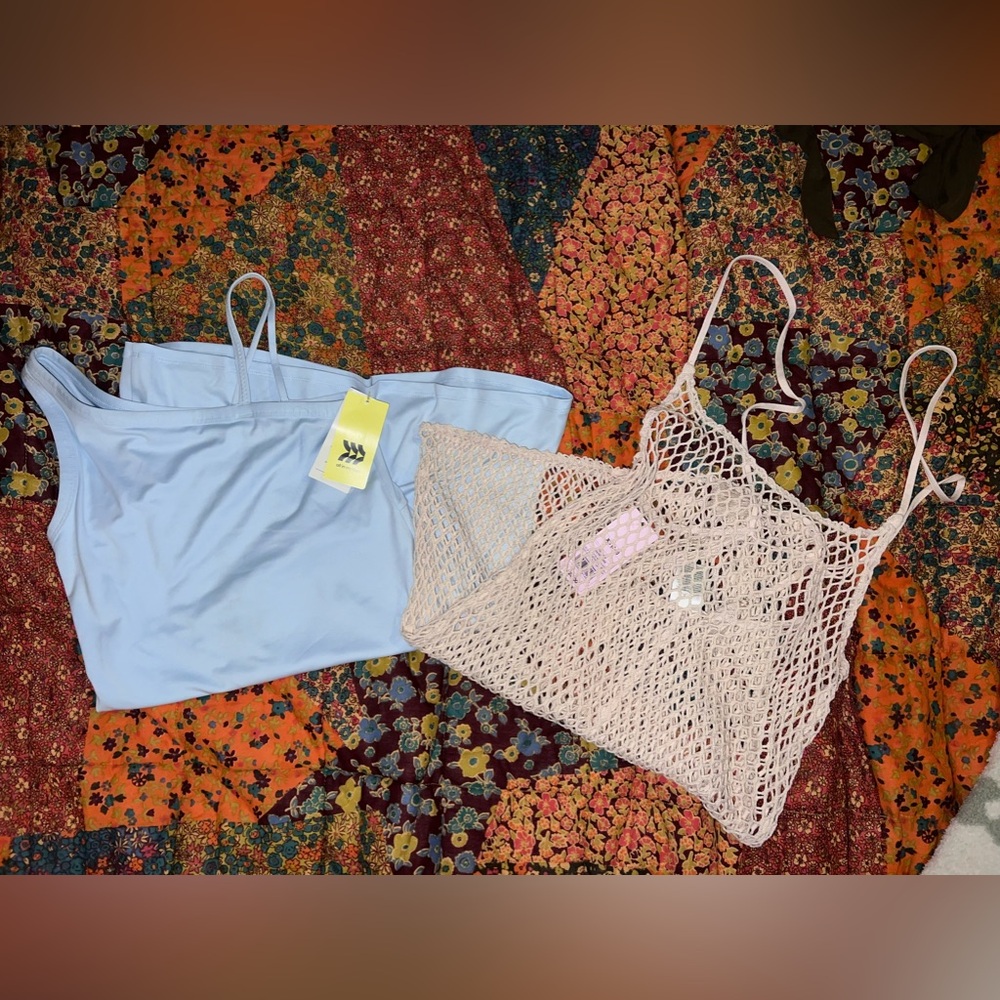 Target dresses. Swimsuit cover up and athletic dress. Both new with tags.